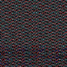 Dense grey and coloured pixel noise resolving into a regular diagonal dot pattern.